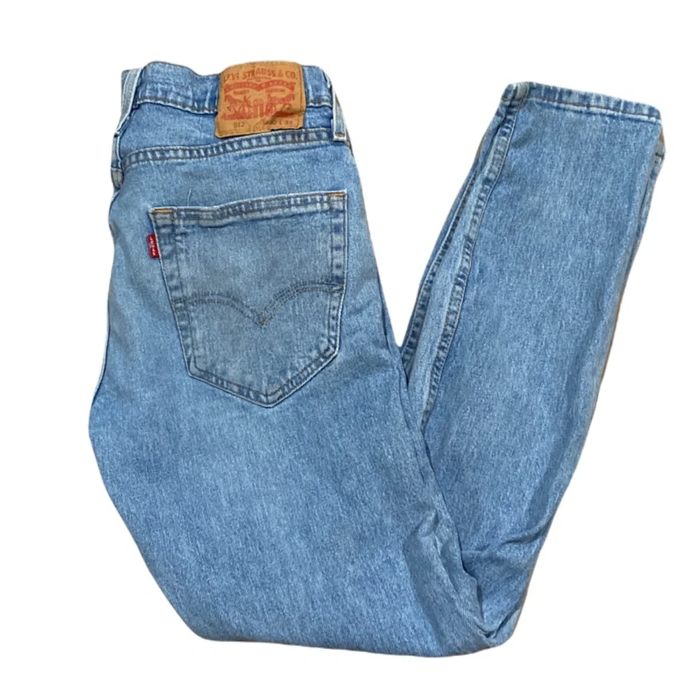 Levi's 512 Slim Fit Distressed Tapered Light Wash Jeans - Picture 10 of 16